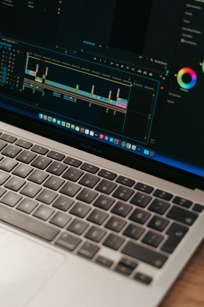 Detailed view of video editing software interface on a MacBook Air.